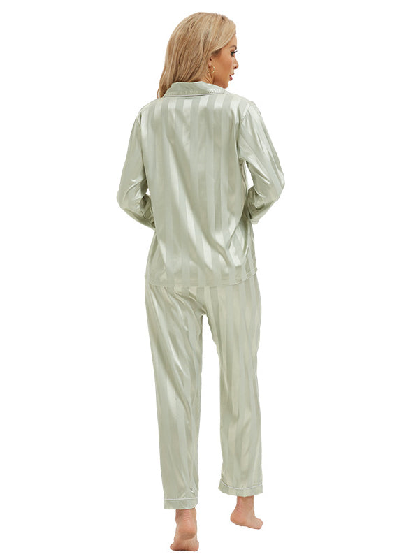 Shimmering sage green satin langry pajamas with bold vertical stripes