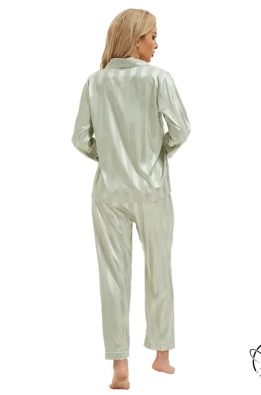 Shimmering sage green satin pajamas with bold stripes in langry fashion