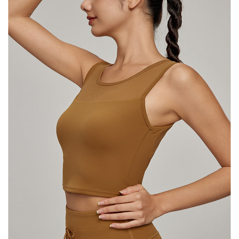 Woman wearing Beauty Back Mesh Workout Top in stylish brown fashion ملابس for fitness