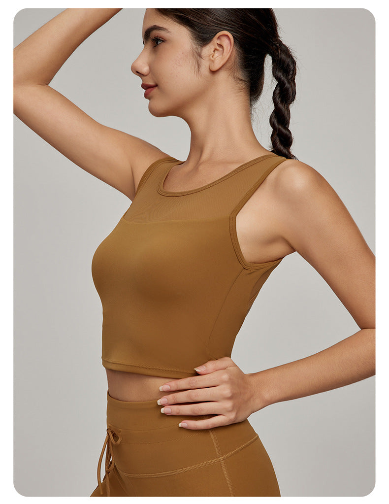 Woman wearing Beauty Back Mesh Workout Top in stylish brown fashion ملابس for fitness