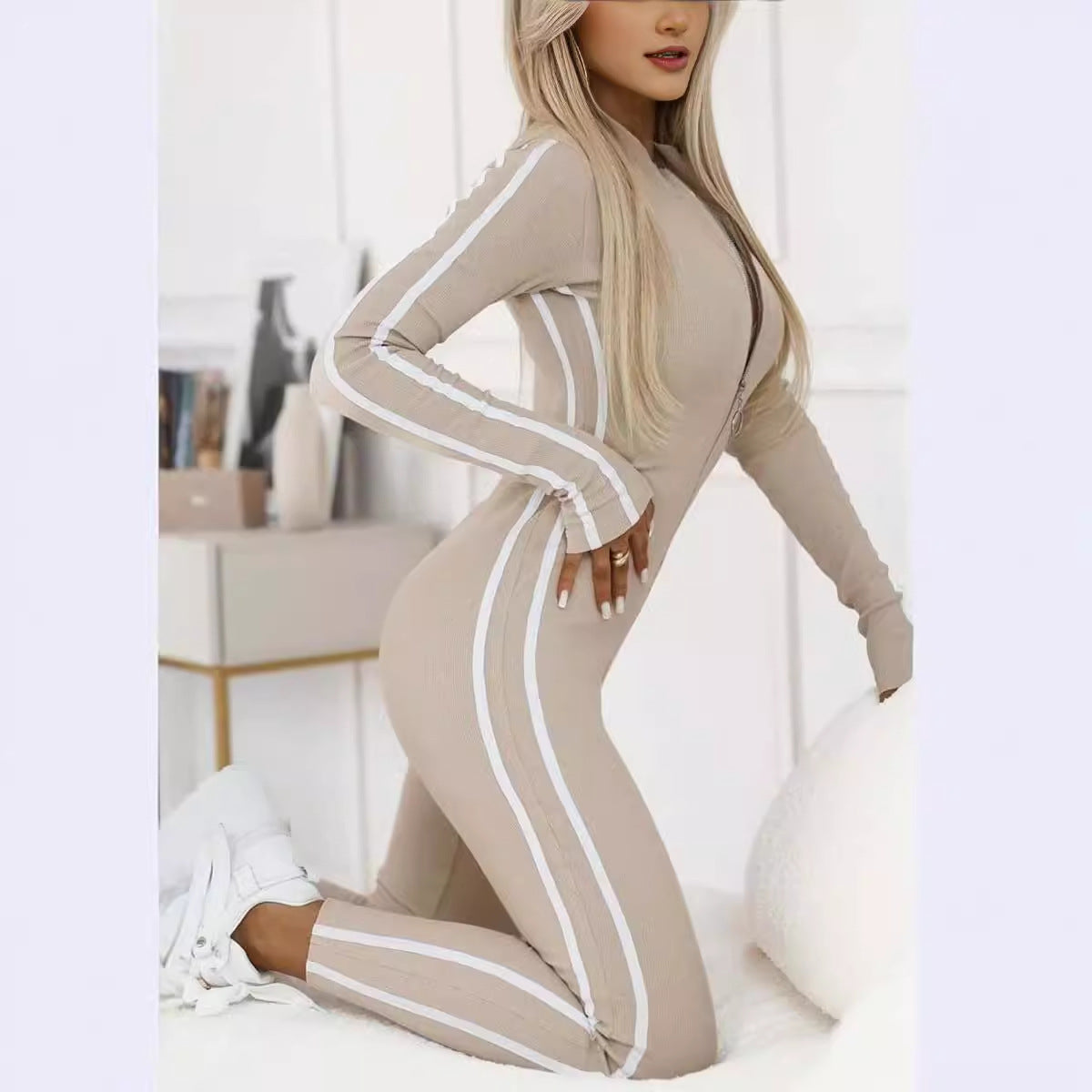 Beige winter slim striped jumpsuit with white stripes and half zipper detail