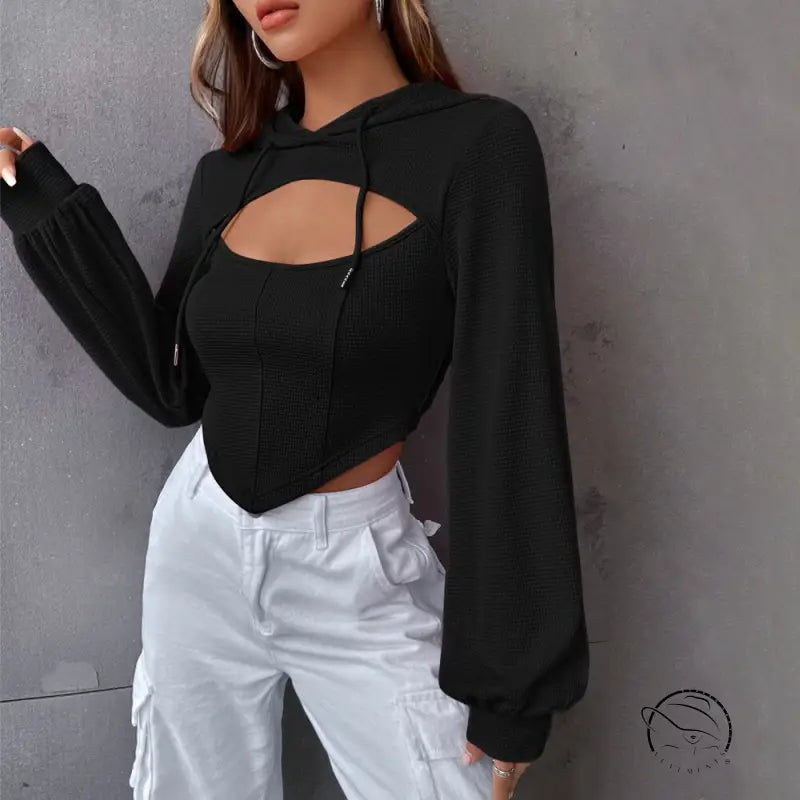 Slim short faux langry fashion top in black cropped hoodie with keyhole cutout and white cargo pants
