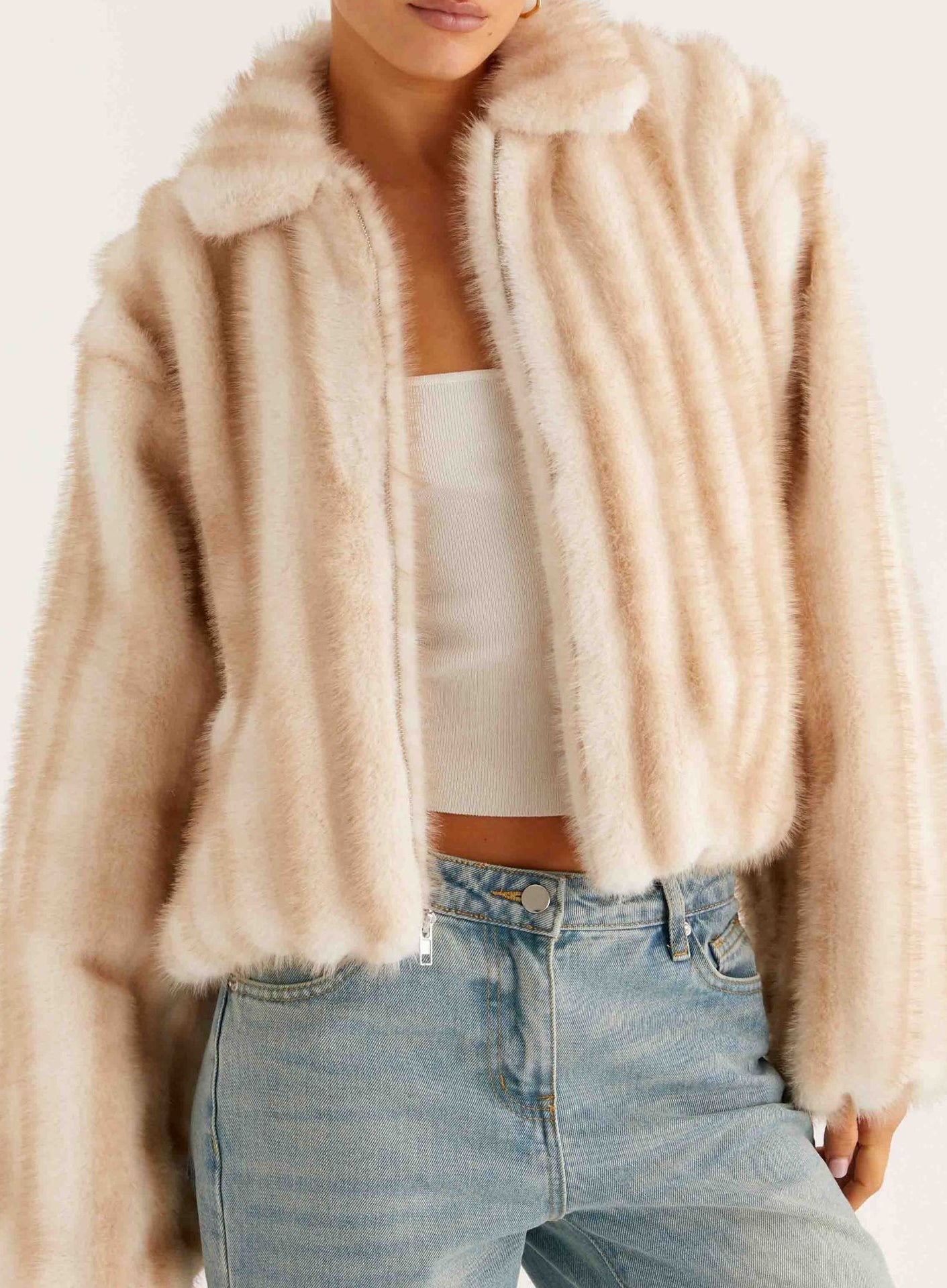Beige faux fur cropped jacket with ribbed detailing and high collar