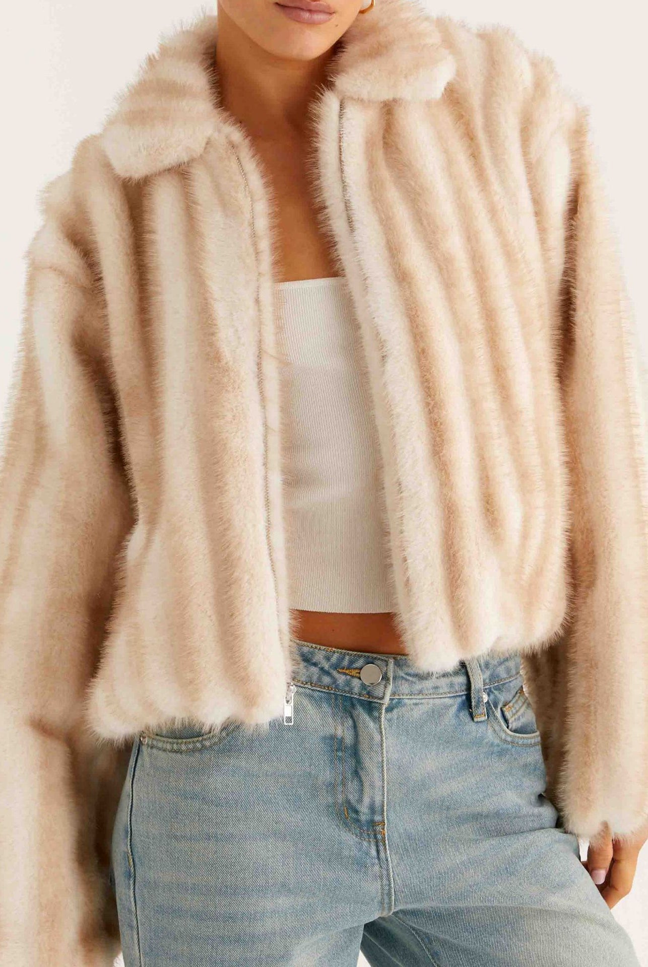 Beige faux fur cropped jacket with ribbed detailing and high collar