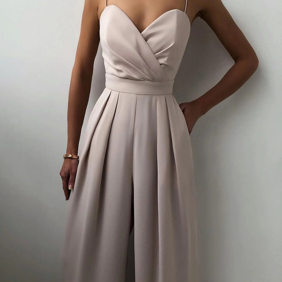Elegant light gray strapless jumpsuit with pleated pants, a modern fashion statement