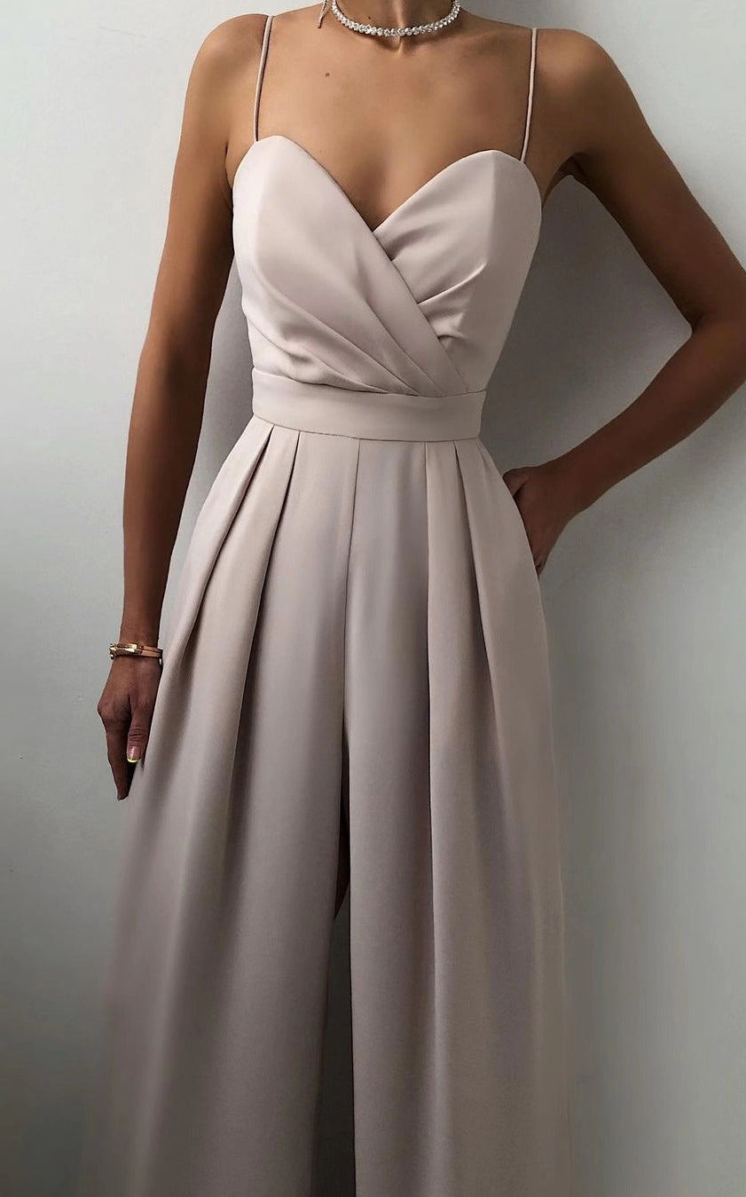 Elegant light gray strapless jumpsuit with pleated pants, a modern fashion statement