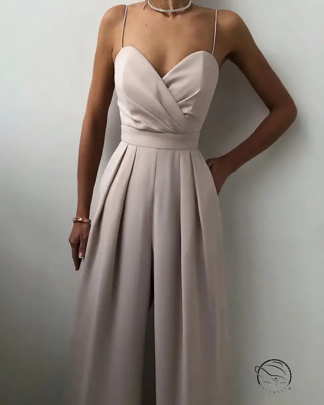 Elegant light gray strapless modern jumpsuit with pleated pants