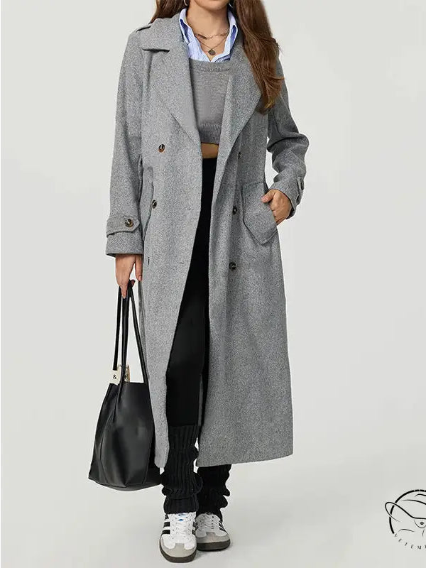 Long gray wool coat with double-breasted design and large pockets for fashion