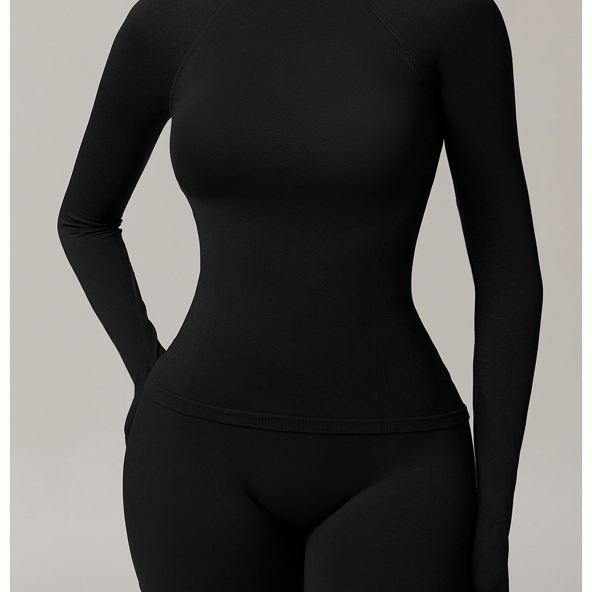 Black long-sleeved top and shorts set for running sport fashion and comfort