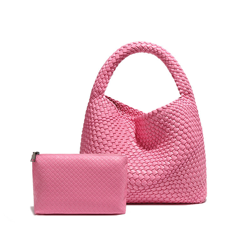 Pink woven handbag with matching pouch showcasing Langry fashion style ملابس accessories