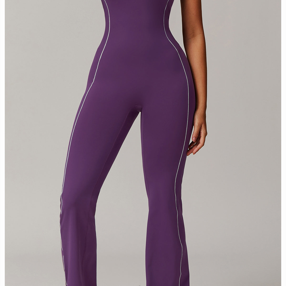 Purple jumpsuit with white trim from Hip Lifting Pleated Slightly Pull Yoga Jumpsuit fashion