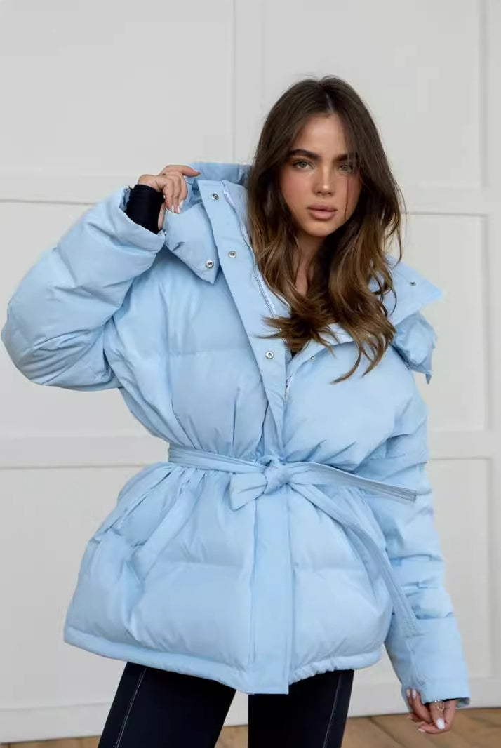 Light blue puffy winter jacket with tie-waist, stylish ملابس for cold weather fashion