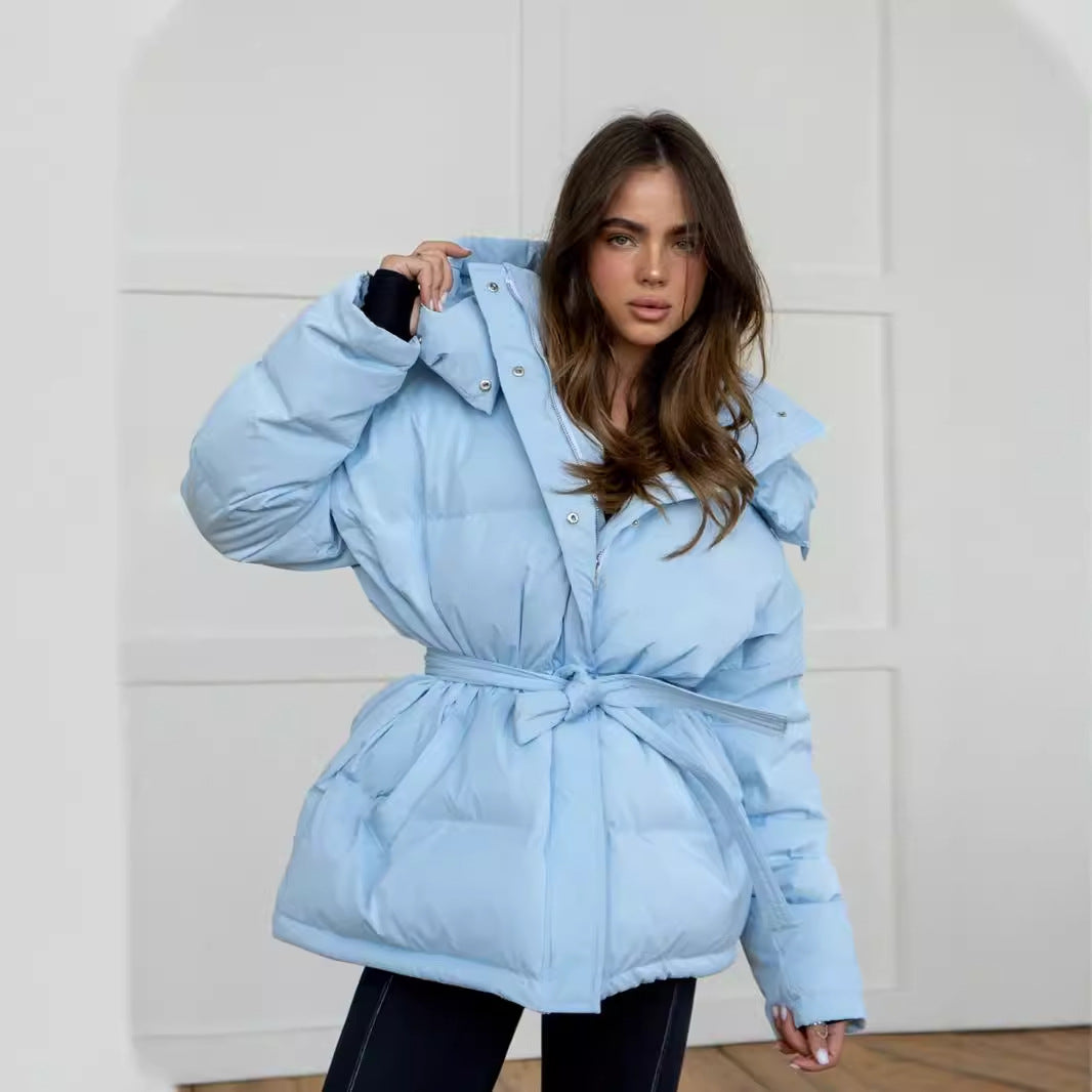Light blue puffy winter jacket with tie-waist, stylish ملابس for cold weather fashion