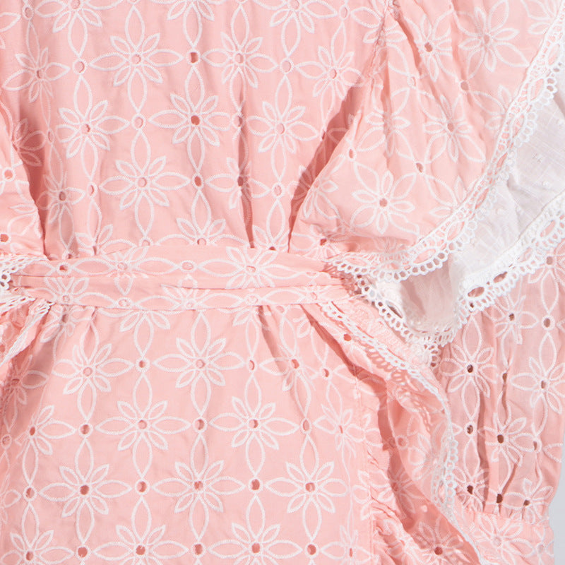 Pink eyelet fabric with white lace trim on a French Sweet Summer dress featuring a stand collar and fashion appeal