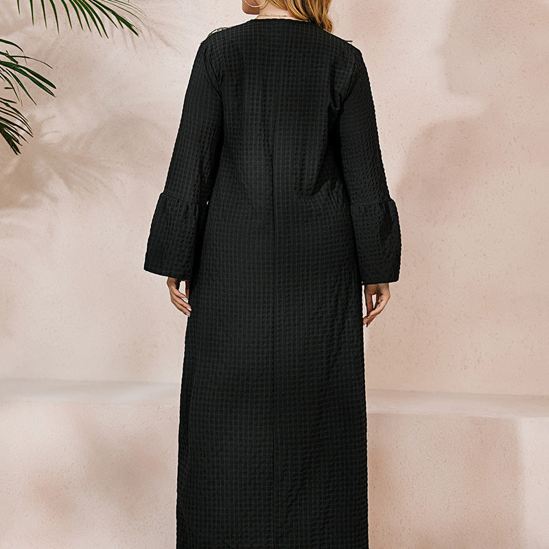Black textured winter robe dress with flared sleeves and elegant embroidery