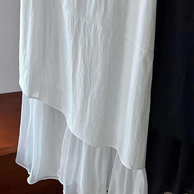 Elegant Korean style dress featuring a white layered design with a ruffled hem