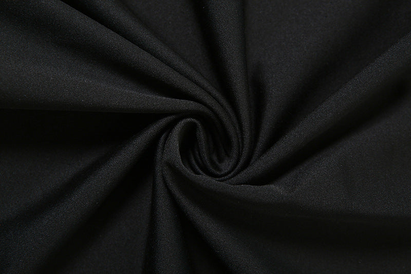 Swirling black fabric of Elegant Party Maxi Dress showcasing luxury and fashion elegance