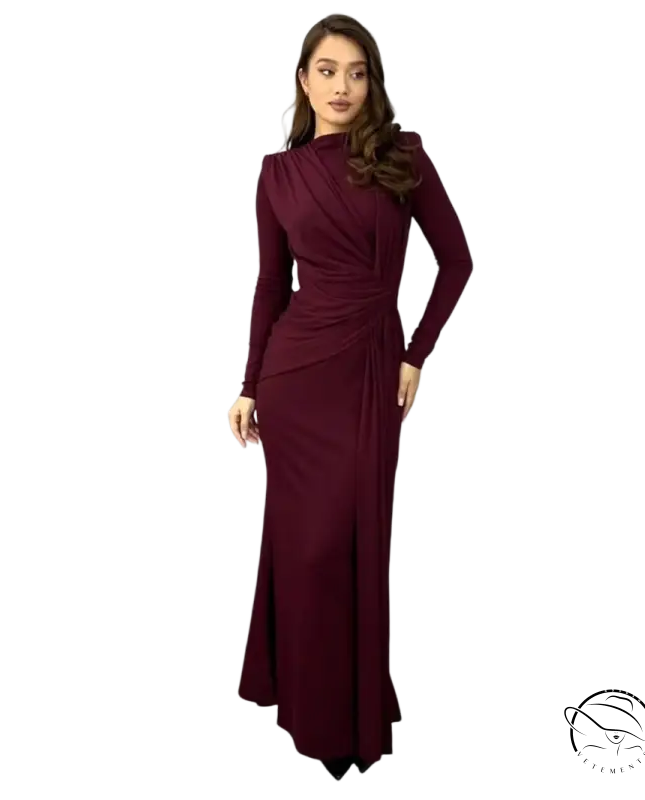 Sleek burgundy long-sleeved maxi dress with draped neckline and fitted silhouette