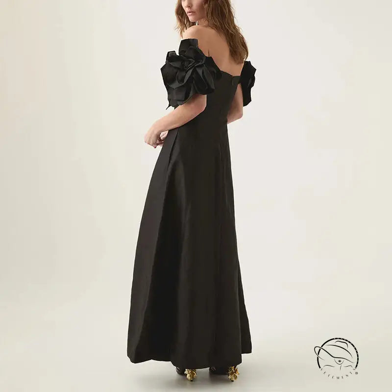 Graceful tube black off-the-shoulder maxi dress with floral accents