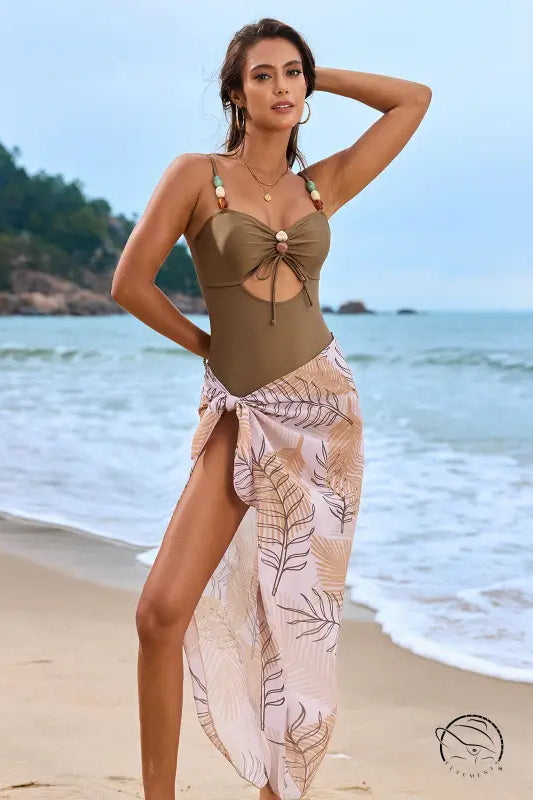 Light and elegant one piece swimsuit with brown design and pink floral sarong