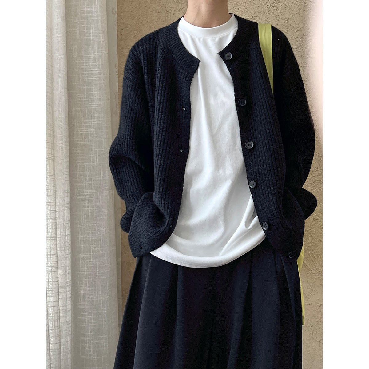 Black button-down cardigan with regular sleeves from the Chic Cardigan Sweater collection, perfect for fashion