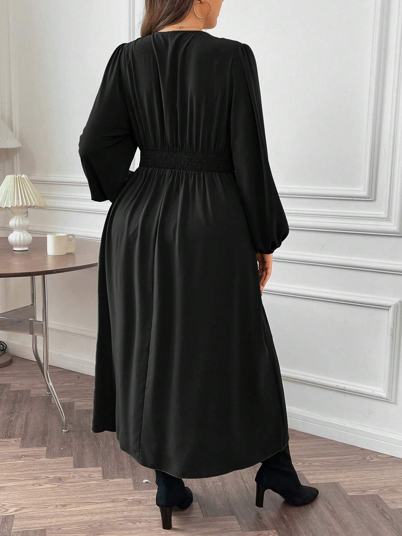 Gorgeous large swing dress for plus-size women with long sleeves, cinched waist, pleated skirt