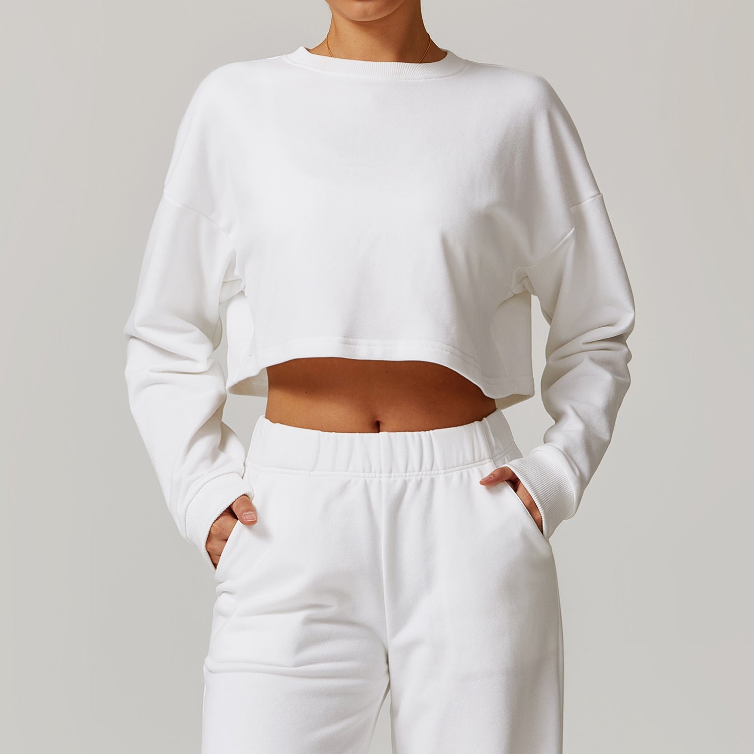 White cropped sweatshirt and sweatpants for long sleeve fashion sportswear collection