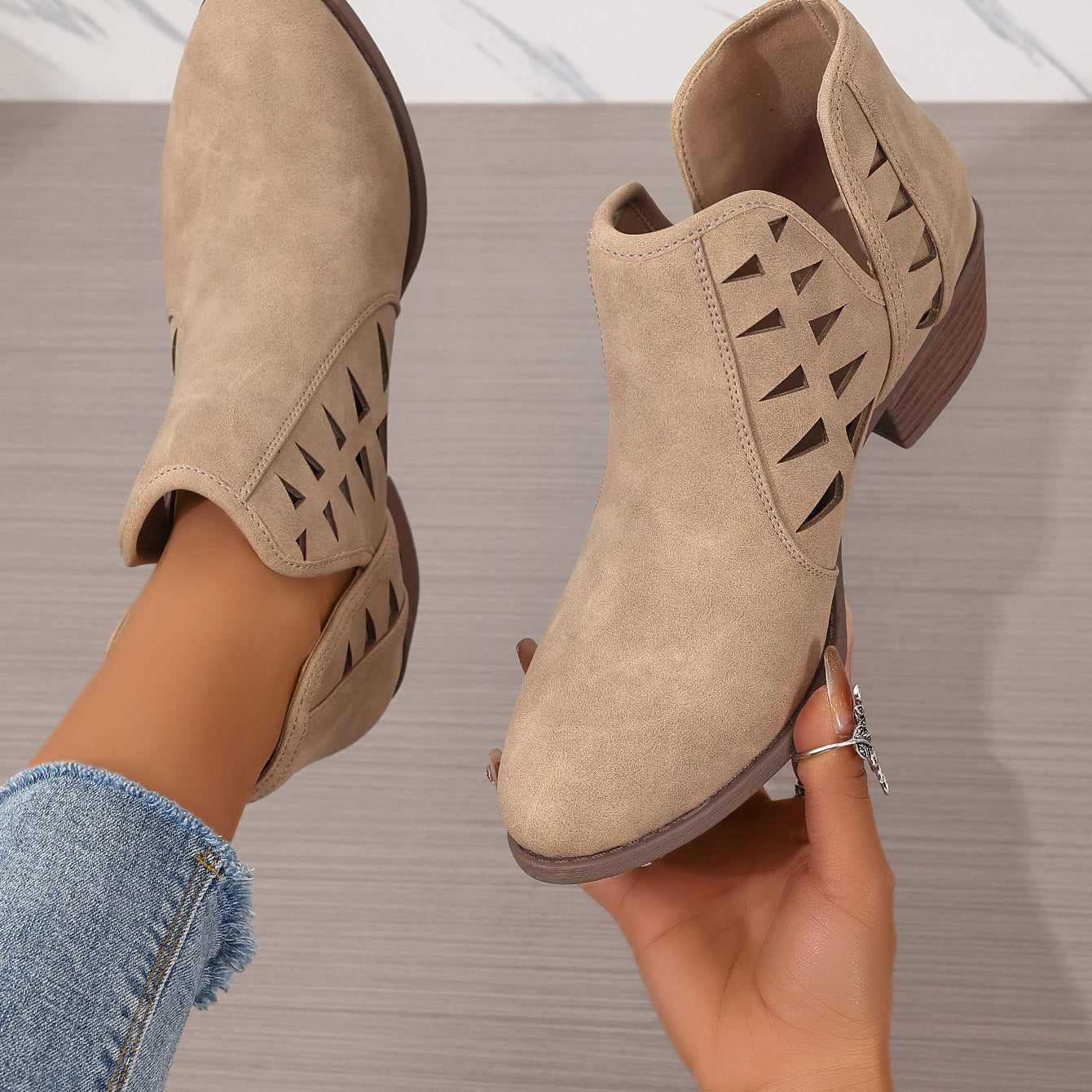 Beige suede Daily Ankle Boots featuring cutout side details and low stacked heels