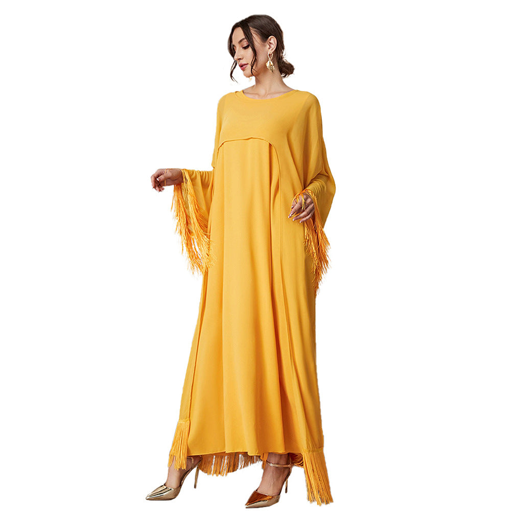 Yellow fringed langry fashion mesh dress with bell sleeves and high heels