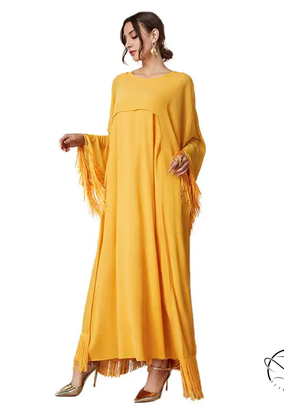 Yellow fringed fashion langry mesh dress with bell sleeves and heels
