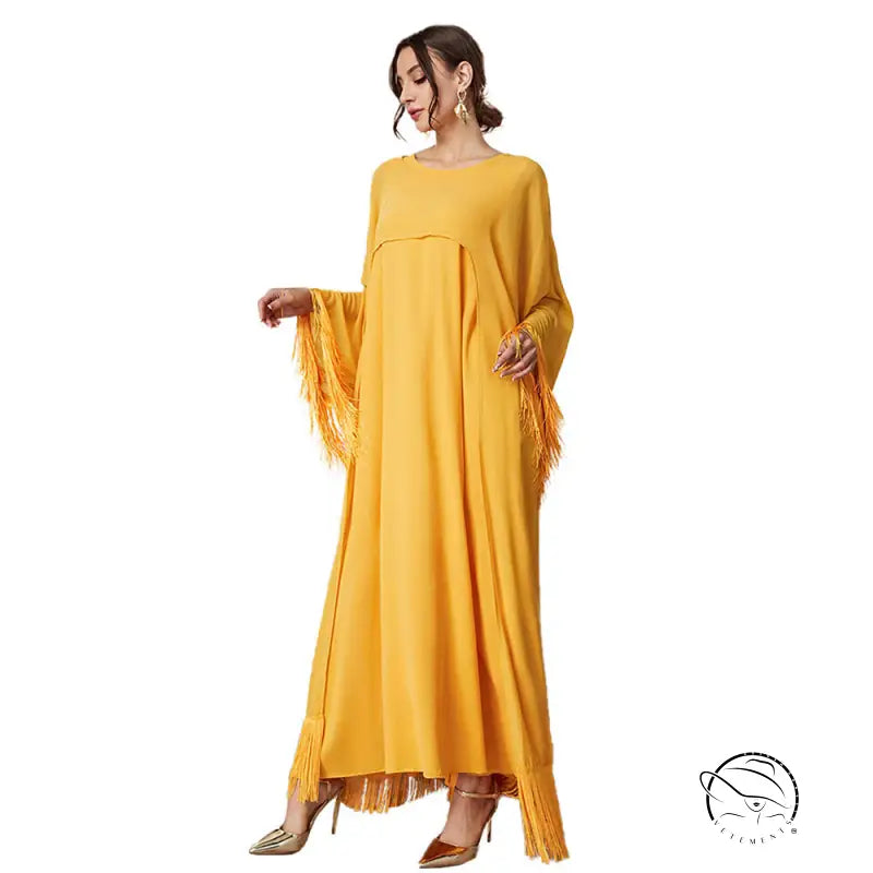 Yellow fringed fashion langry mesh dress with bell sleeves and heels