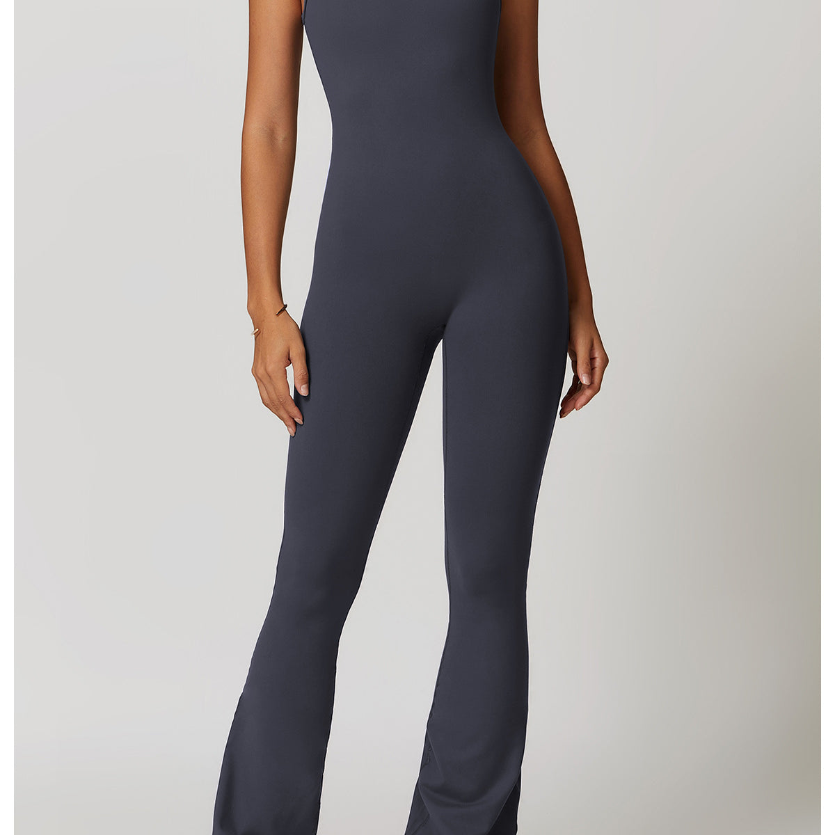 Sleeveless charcoal gray athletic jumpsuit with flared legs for fashionable yoga ملابس