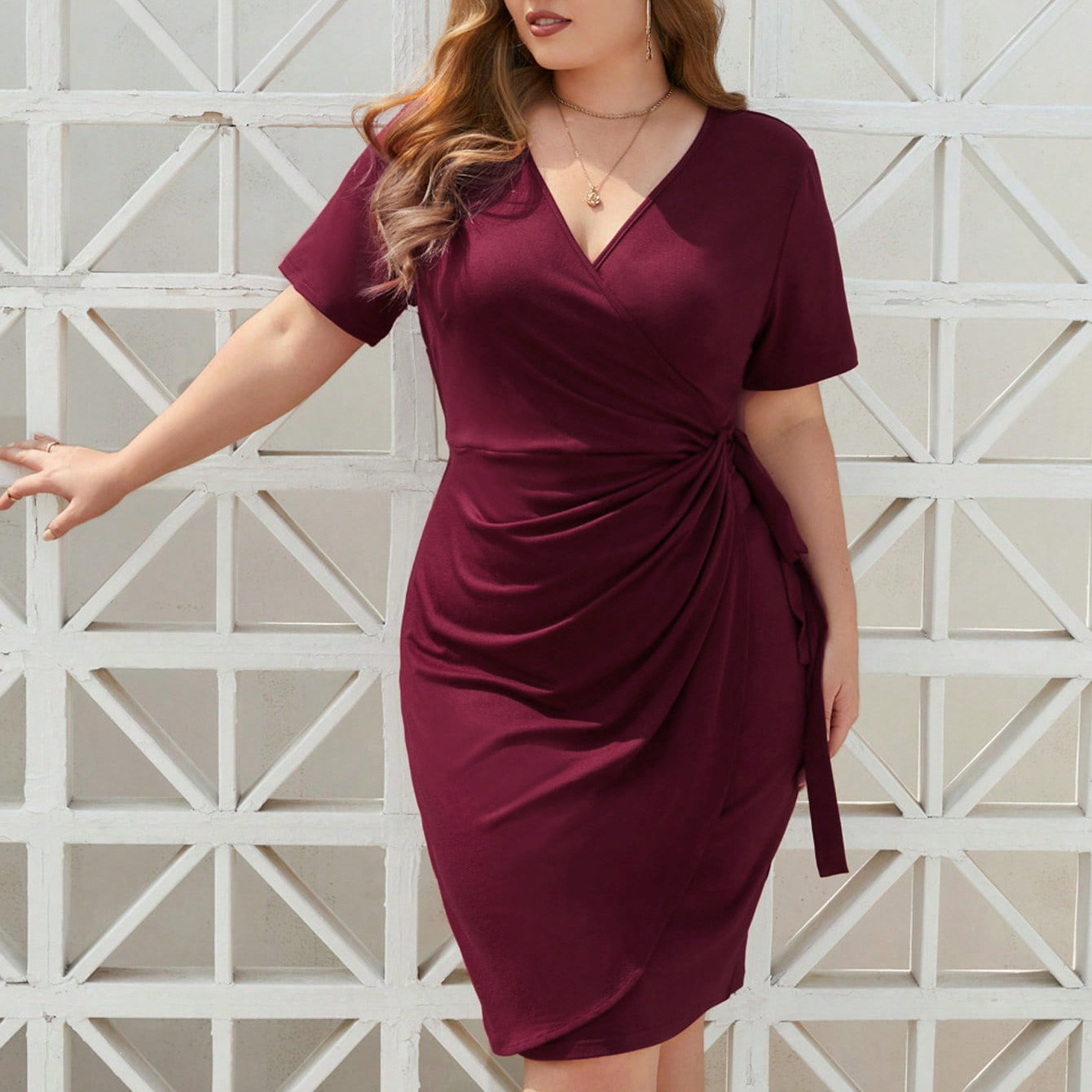 Elegant Burgundy wrap dress showcasing sophisticated fashion and stylish ملابس elegance
