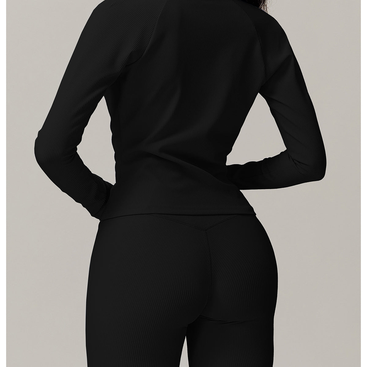 Black long-sleeved romper with fitted shorts for casual running fashion ملابس style