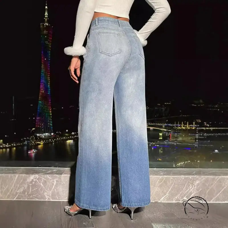 Women’s light blue ombre denim trousers with high heels