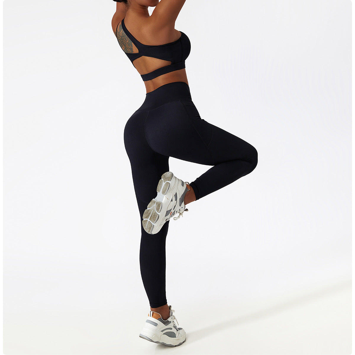 Black high-waisted leggings and sports bra set for stylish athletic fashion and comfort