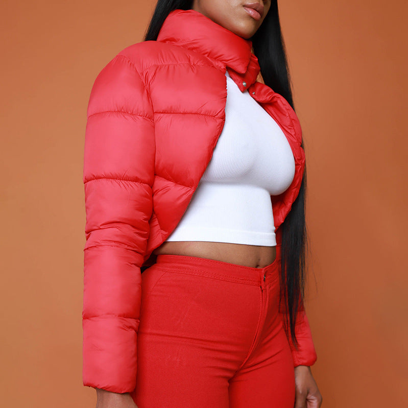 Red cropped puffer jacket with slim fit design and winter half turtleneck feature