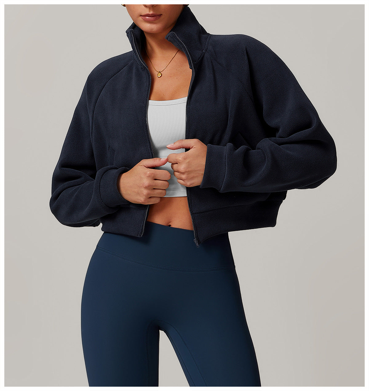 Navy blue cropped zip-up Running Windproof Velvet Fitness Coat with white crop top and blue leggings