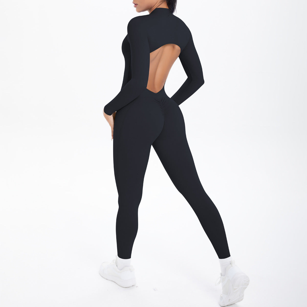 Black long sleeve yoga bodysuit with back cutout and zipper