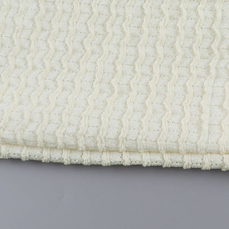 Textured off-white fabric of Autumn Classic split dress showcases elegant fashion style