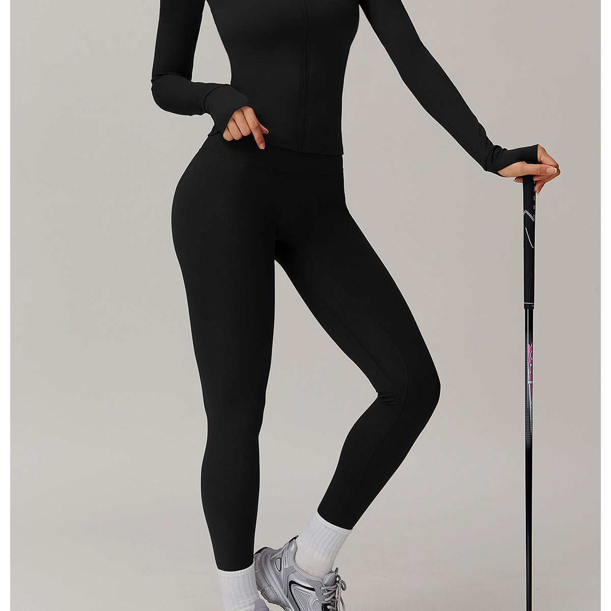 Black long-sleeved athletic jumpsuit and leggings for stylish langry fashion ملابس