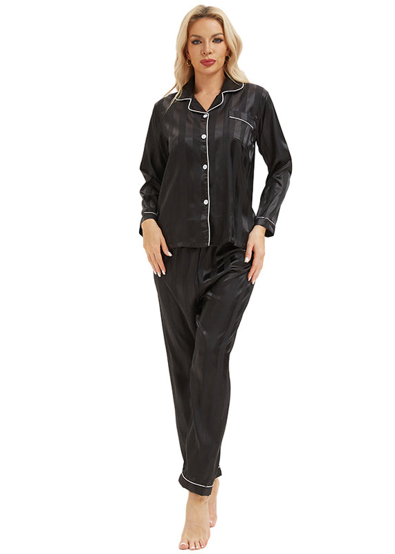 Black satin langry pajamas with shimmer, white piping, and bold stripes