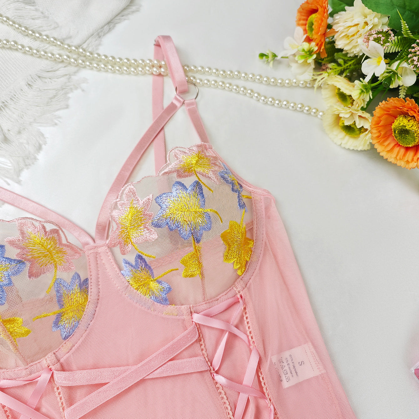 Pink floral lace lingerie set with sheer mesh crisscross straps