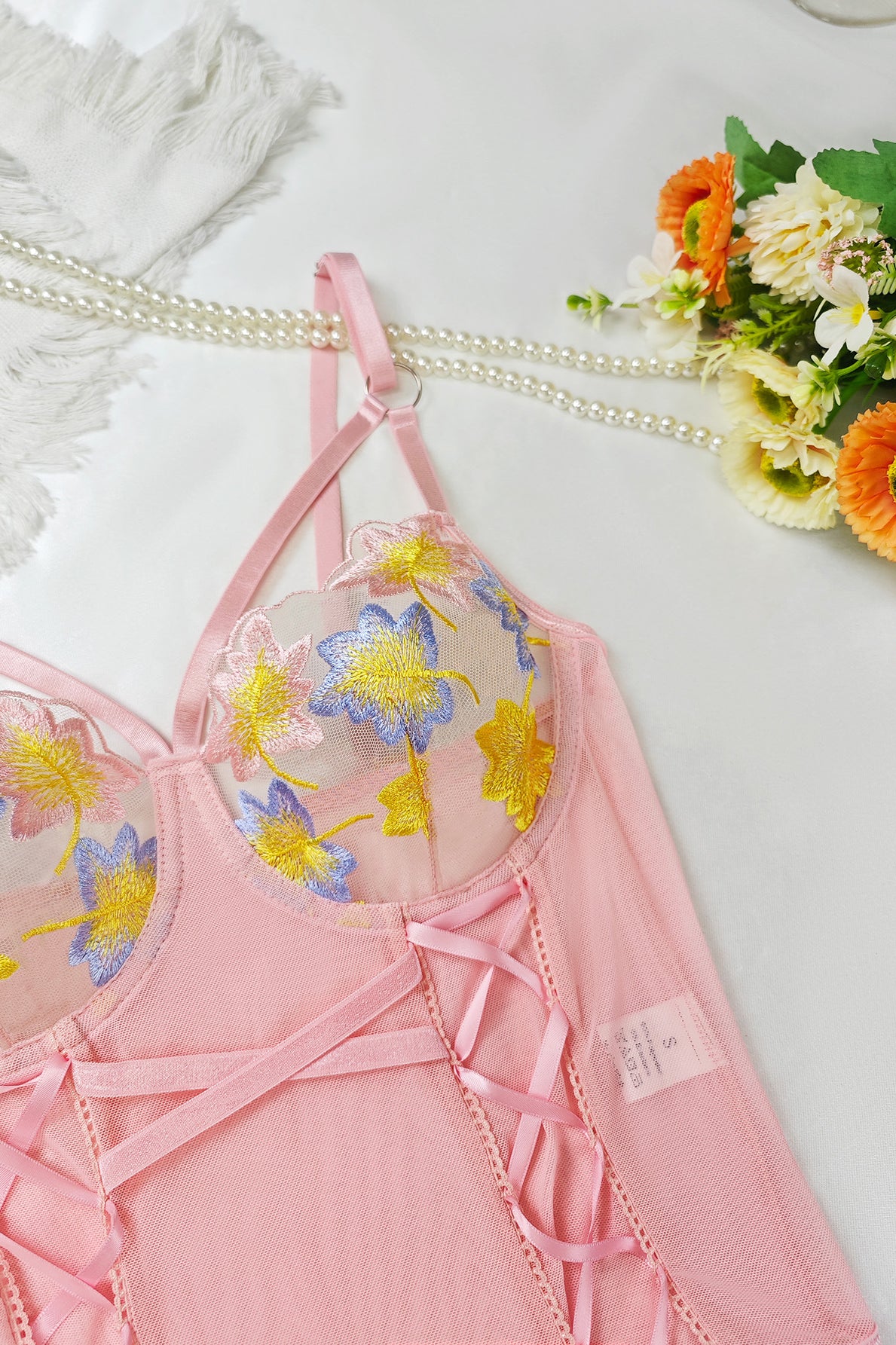 Pink floral lace lingerie set with sheer mesh crisscross straps