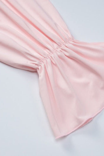 Pink long-sleeved blouse with ruffled cuff for sexy halter low cut ruffled dress style