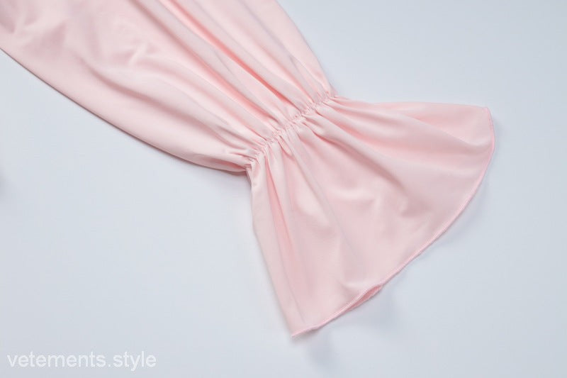Pink long-sleeved blouse with ruffled cuff for sexy halter low cut ruffled dress style