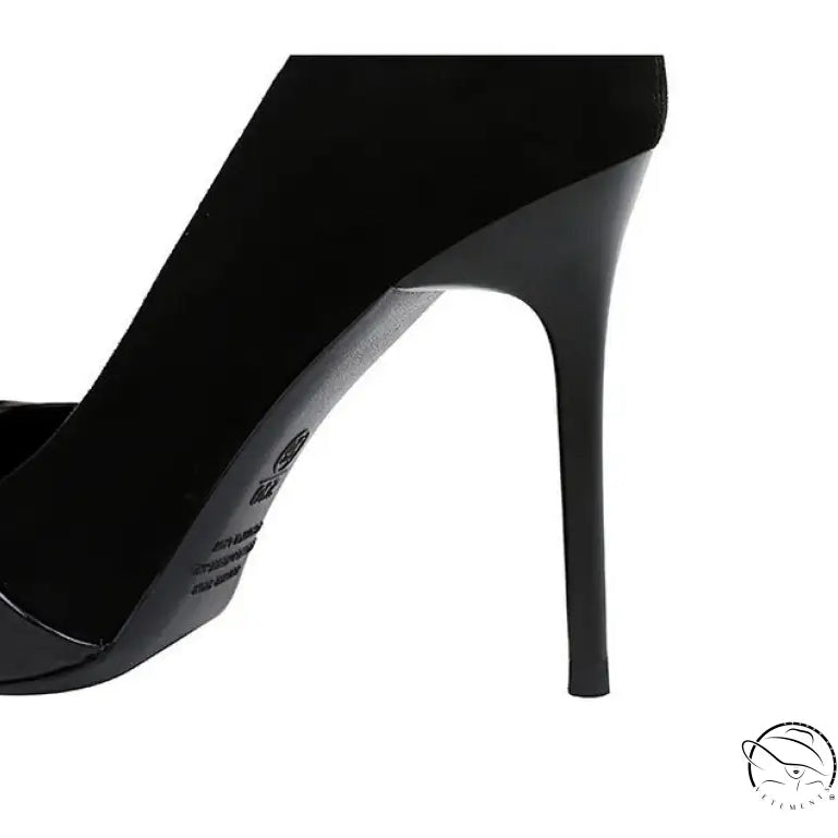 Langry black patent leather stiletto high heel with skull sole design