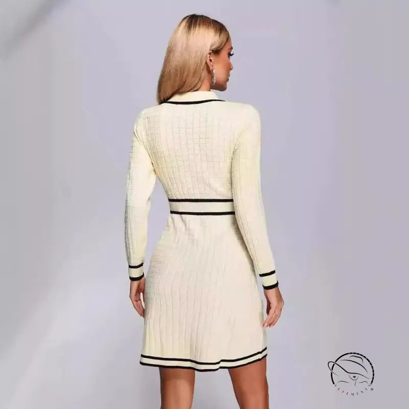 Cream-colored knitted classic dress with black trim