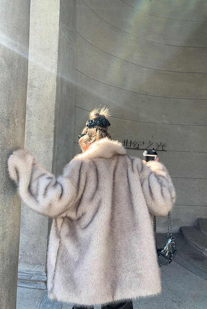 Langry faux fur shearling jacket in light beige with white trim