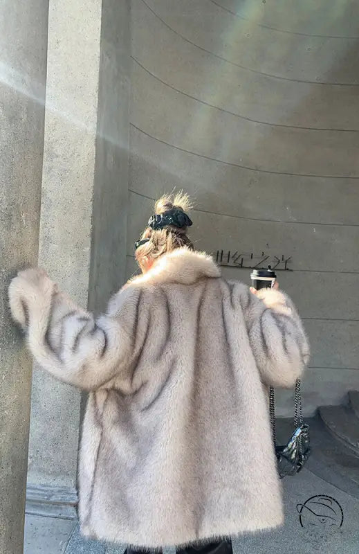 Light beige faux fur shearling winter jacket with fur trim